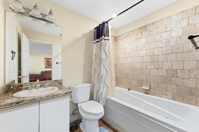 full bathroom featuring shower / bath combo with shower curtain, vanity, and toilet