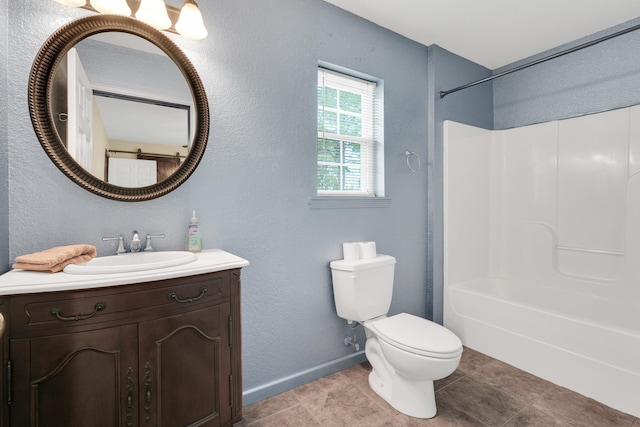 full bathroom featuring vanity, toilet, washtub / shower combination, and tile patterned floors