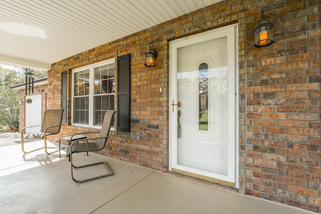 doorway to property with a porch