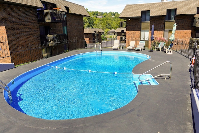 view of pool with a patio area