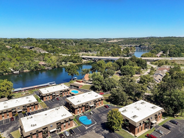 birds eye view of property featuring a water view