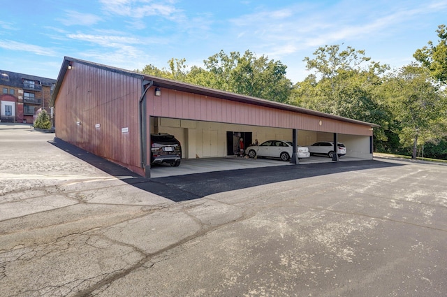 exterior space featuring a carport