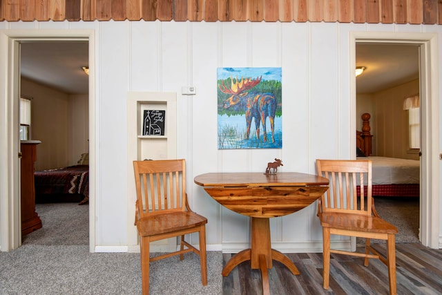 dining space with dark wood-type flooring