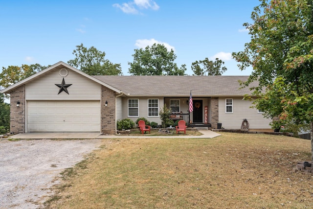 single story home with a front lawn and a garage