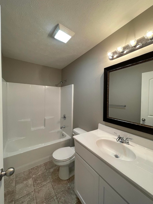 full bathroom with a textured ceiling, vanity, shower / tub combination, and toilet