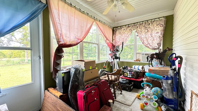 interior space with a healthy amount of sunlight and ceiling fan