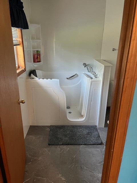 bathroom with a bath