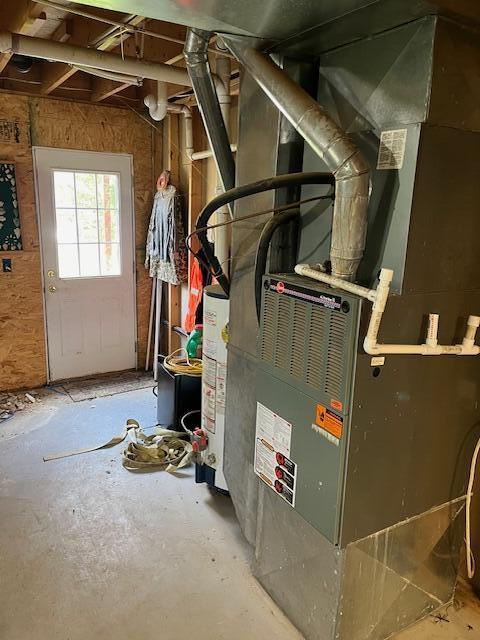 utility room with water heater