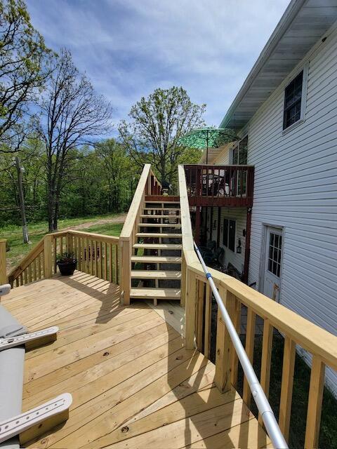 deck featuring stairs