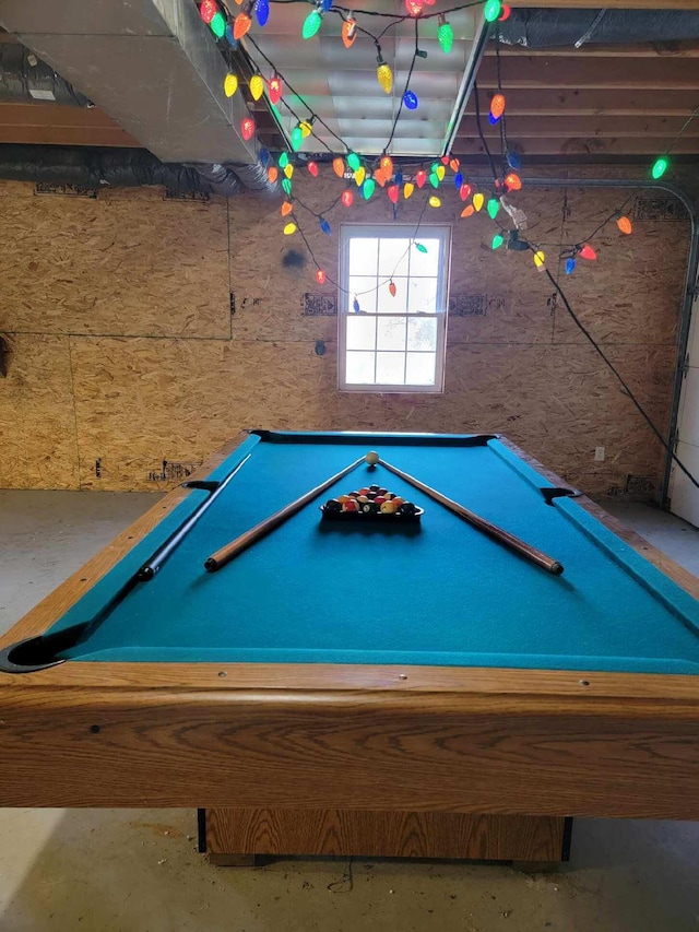 rec room with pool table and concrete flooring