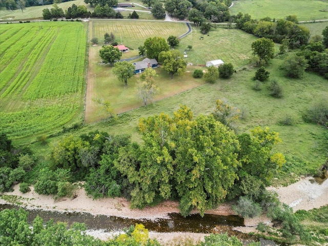 birds eye view of property with a rural view