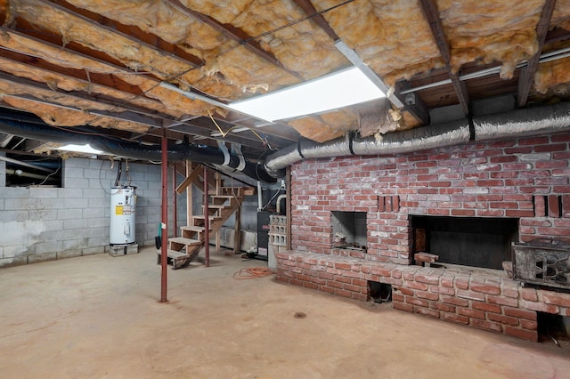 basement featuring a fireplace and electric water heater