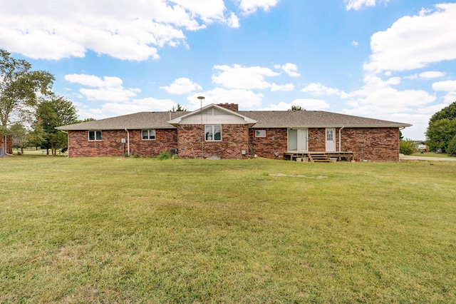 view of front of home with a front lawn