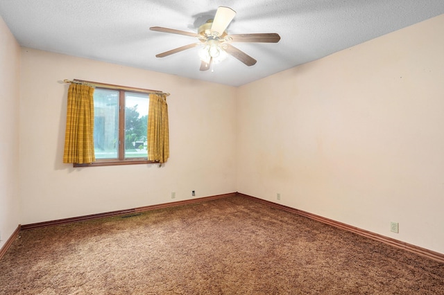 unfurnished room featuring ceiling fan, a textured ceiling, and carpet flooring