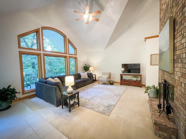 6643 E Turner Springs Dr, Springfield, MO 65809 - living area with baseboards, high vaulted ceiling, a brick fireplace, and a ceiling fan
