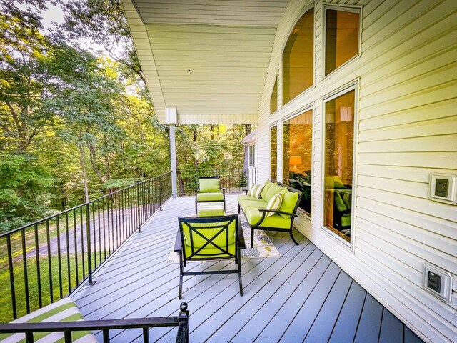 6643 E Turner Springs Dr, Springfield, MO 65809 - wooden terrace with an outdoor hangout area