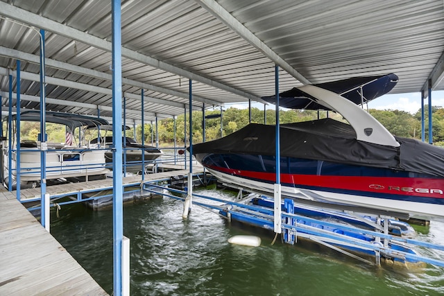 dock area with a water view