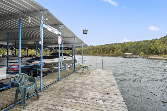 view of dock featuring a water view