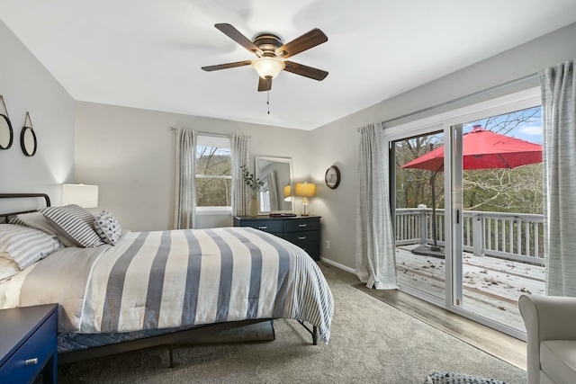 bedroom featuring ceiling fan and access to outside