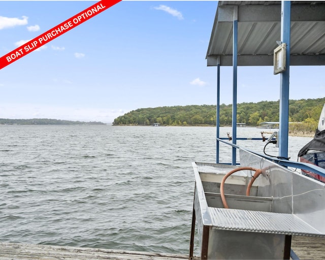 view of dock with a water view