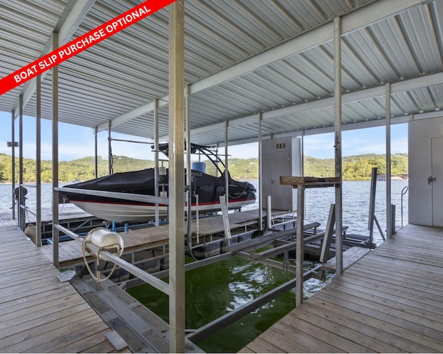 view of dock featuring a water view and boat lift