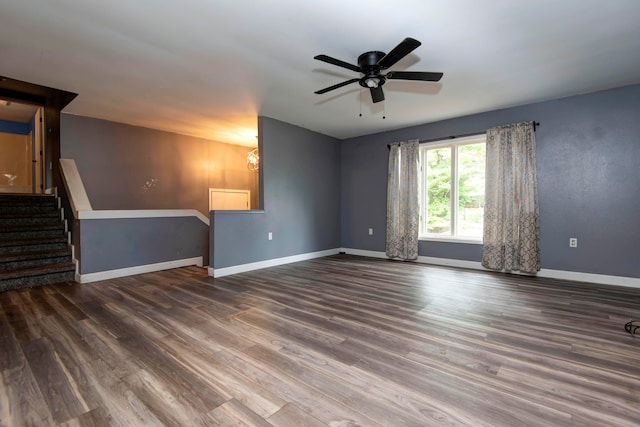 unfurnished living room featuring ceiling fan and wood-type flooring