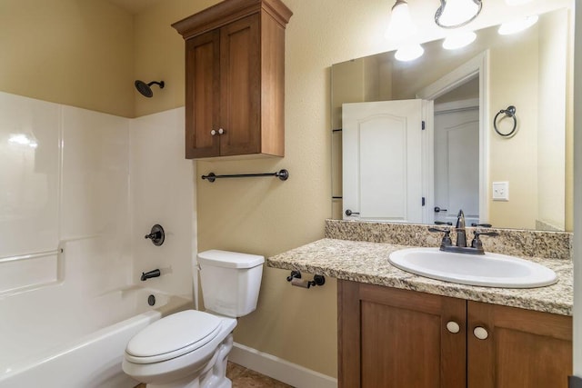 full bathroom featuring vanity, tub / shower combination, and toilet