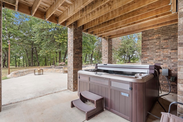 view of patio featuring a hot tub