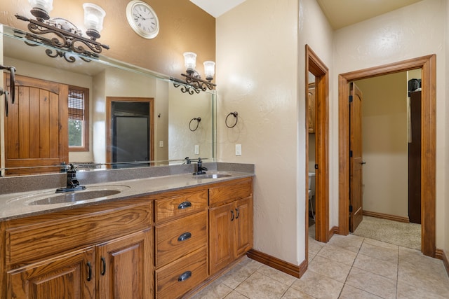 bathroom featuring tile patterned floors and vanity