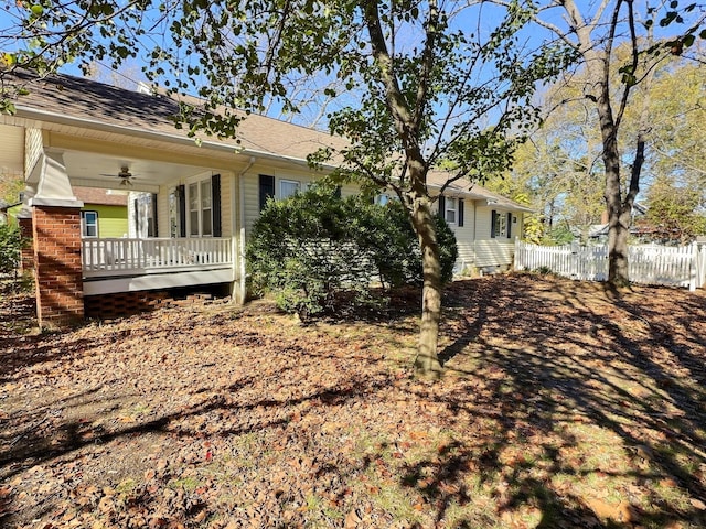 exterior space with covered porch and ceiling fan