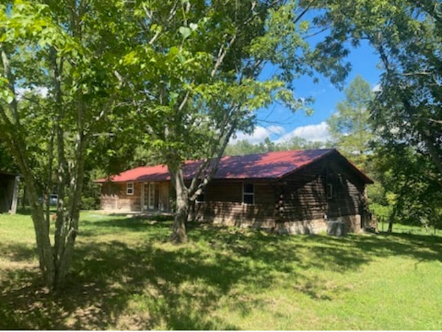 view of front of home with a front yard