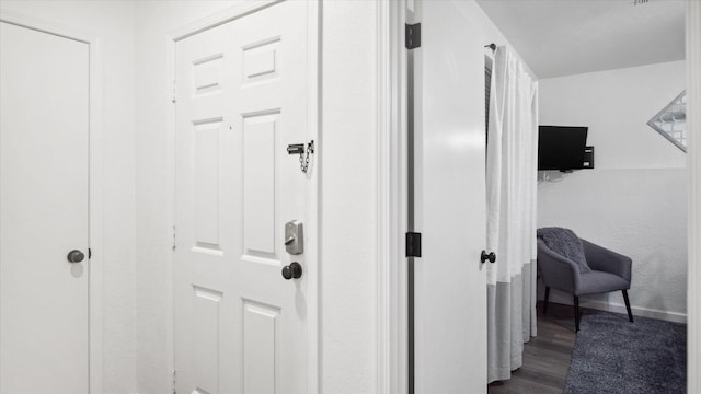 hall featuring hardwood / wood-style flooring