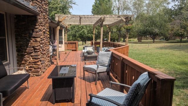 wooden deck with a pergola, an outdoor hangout area, and a yard
