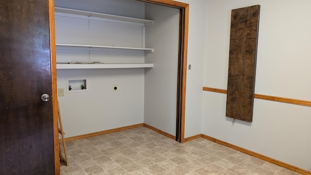 washroom with baseboards, hookup for an electric dryer, laundry area, and washer hookup