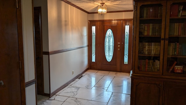 entryway featuring crown molding