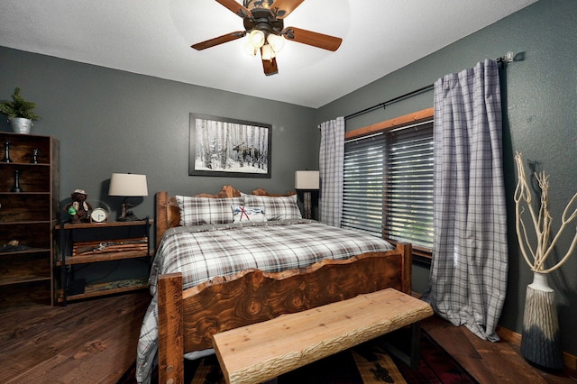 bedroom featuring ceiling fan and wood-type flooring