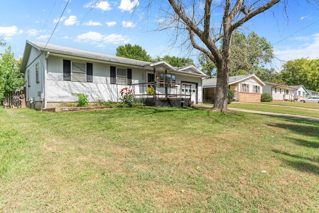 ranch-style home featuring a porch and a front lawn