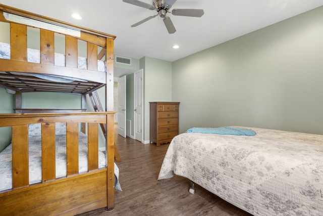 bedroom featuring ceiling fan and dark hardwood / wood-style flooring