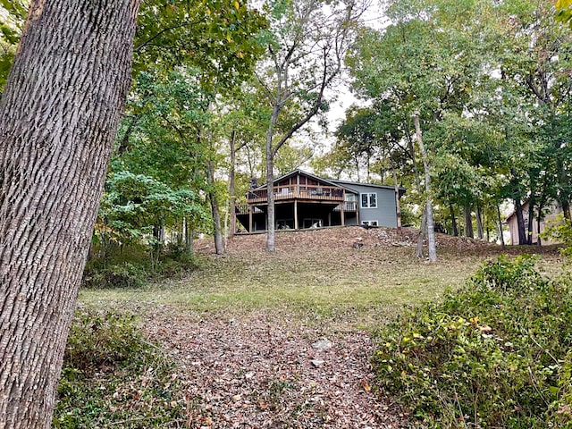 view of yard featuring a wooden deck