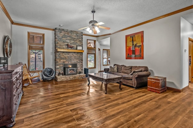 living room with hardwood / wood-style floors, ceiling fan, and a textured ceiling