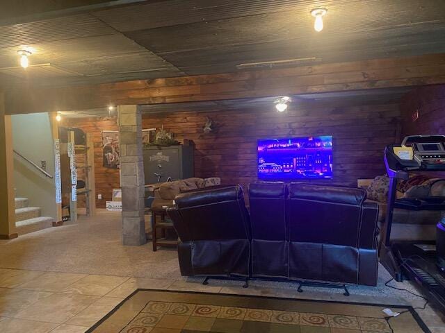 living room featuring wooden walls