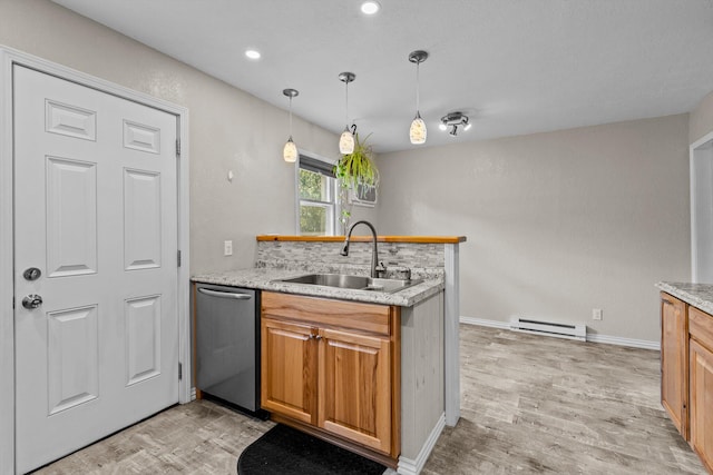 kitchen featuring sink, a baseboard heating unit, pendant lighting, light hardwood / wood-style flooring, and dishwasher