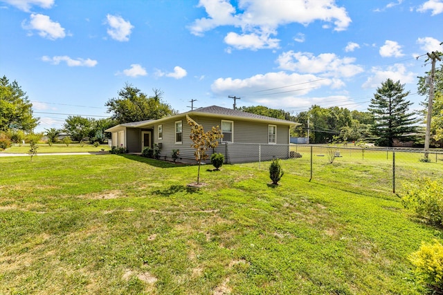 view of property exterior with a yard