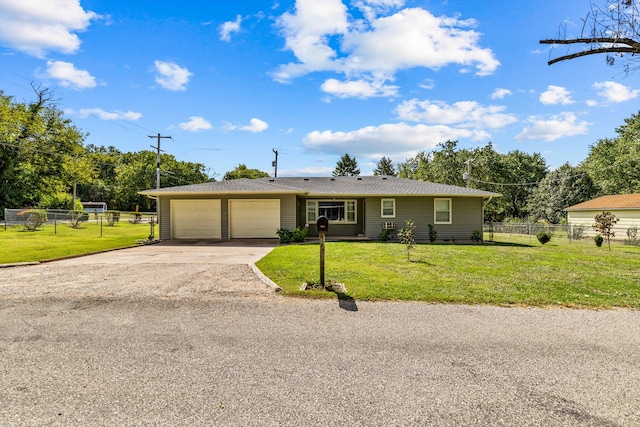 single story home with a front yard and a garage