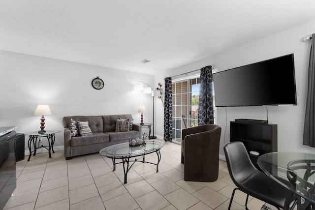 living room featuring light tile patterned floors