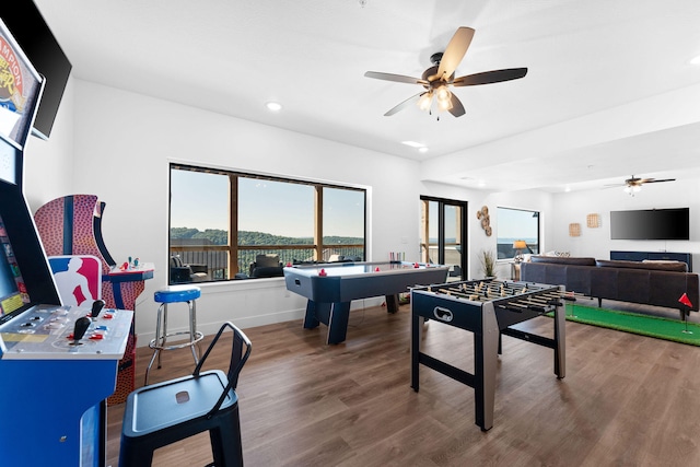 rec room featuring ceiling fan and hardwood / wood-style floors