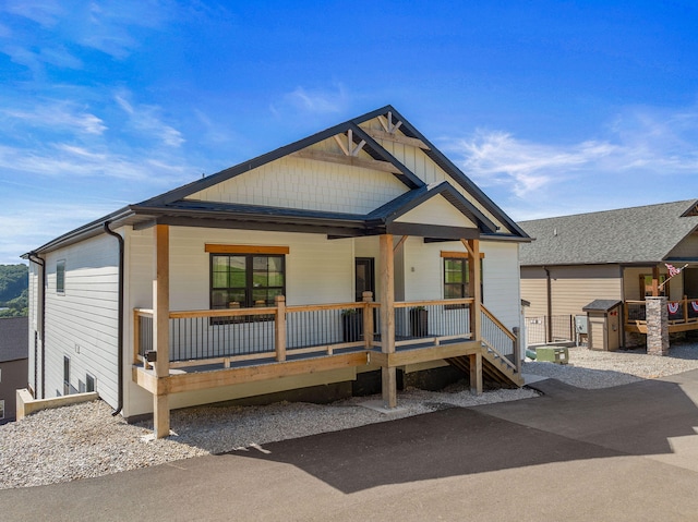 view of front of home featuring covered porch