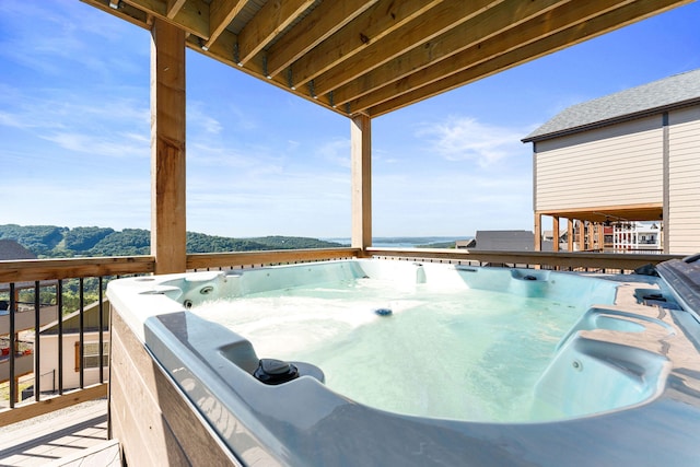 view of pool featuring a hot tub