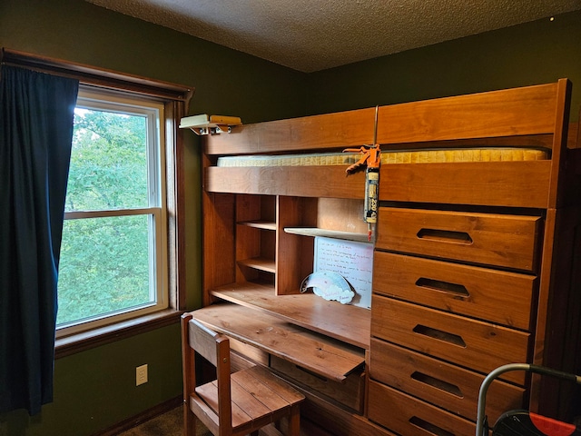 bedroom with a textured ceiling