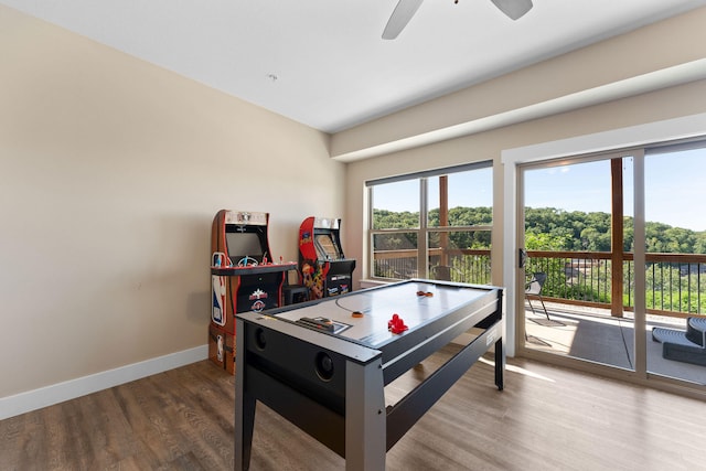 rec room featuring hardwood / wood-style flooring and ceiling fan